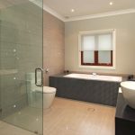 Contemporary Small Bathroom Design Ideas with Grey tile pattern bathtub surround and wooden wall panel ideas 915x686